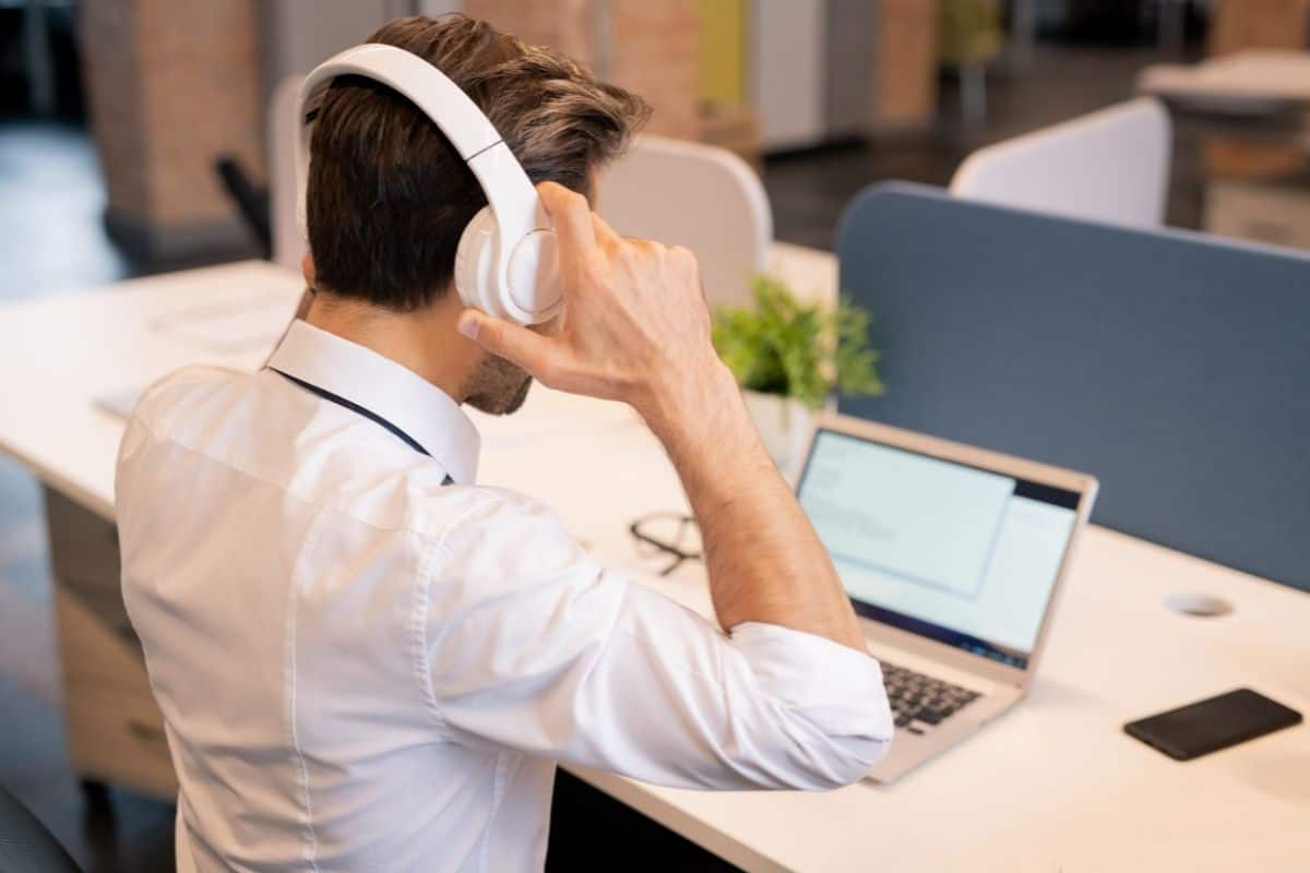 Man wearing headphones at the office